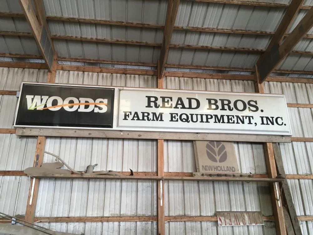 Woods/Reed Brothers Farm Equipment Inc. lighted sign, 3'x18'