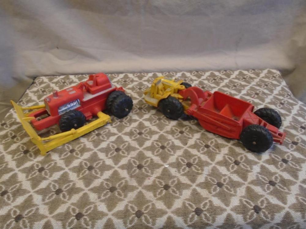 (2) Auburn Rubber Toys