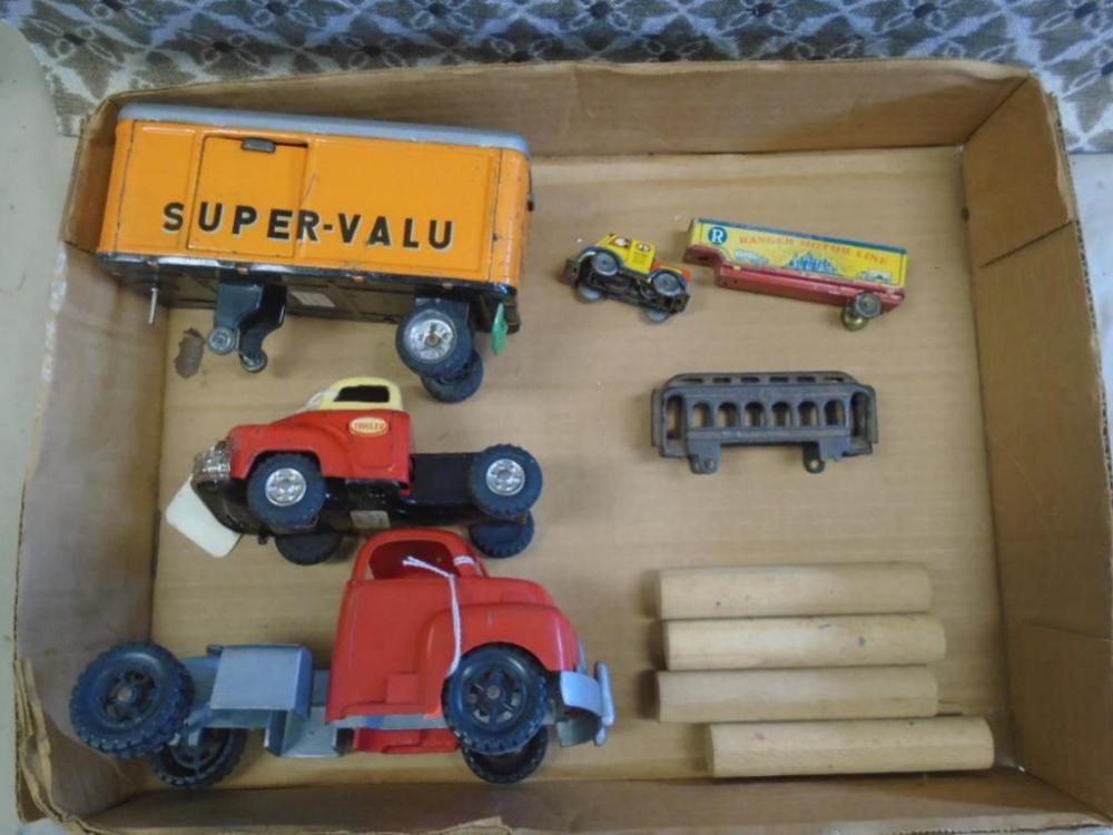 Box lot of tin friction, cast iron & windup trucks