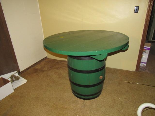 Whiskey barrel table and 4 green bar stools
