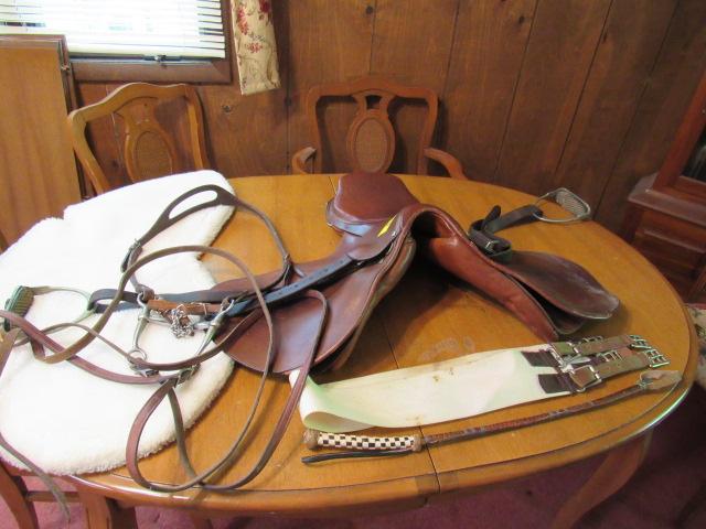 English saddle, blanket, bridle and whip