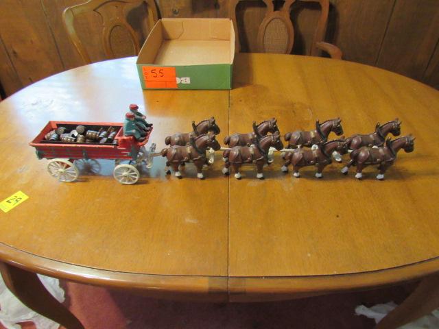 Cast iron wagon and 8 horses.  Some barrels, screws and lines missing