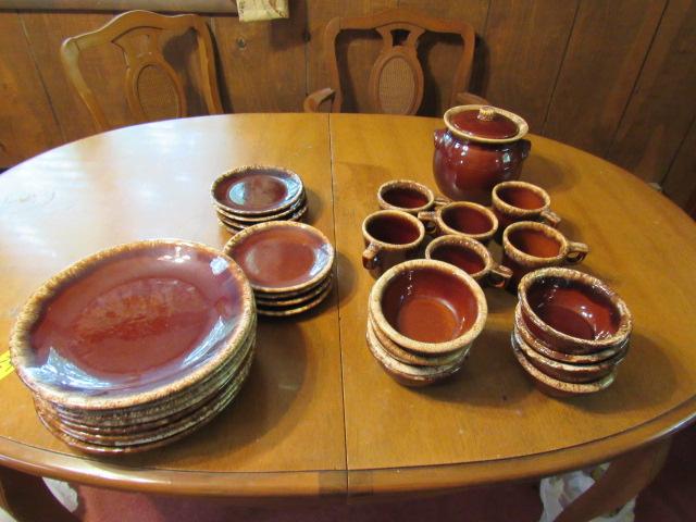 Hull stoneware.  8 plates, bowls, saucers, 6 cups and canister