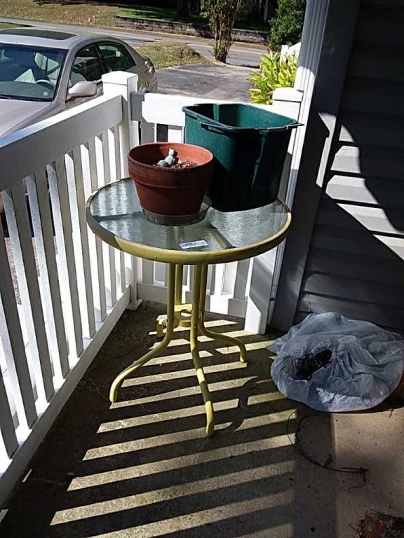 Small patio table & contents