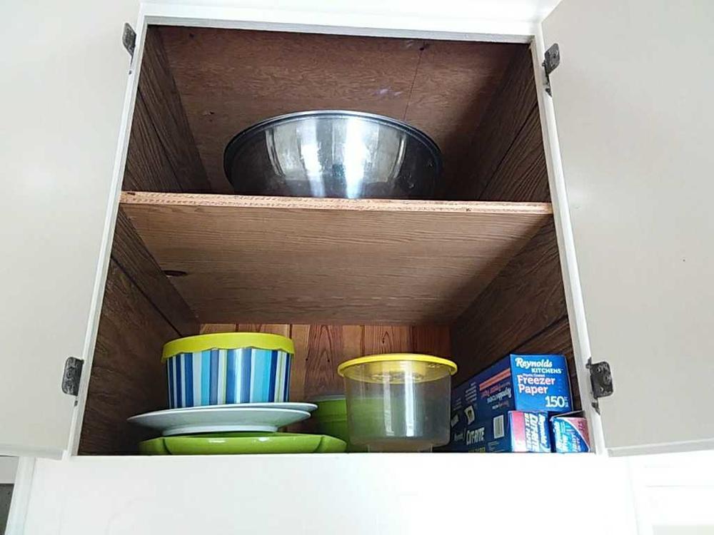Contents of cabinet & inside of oven