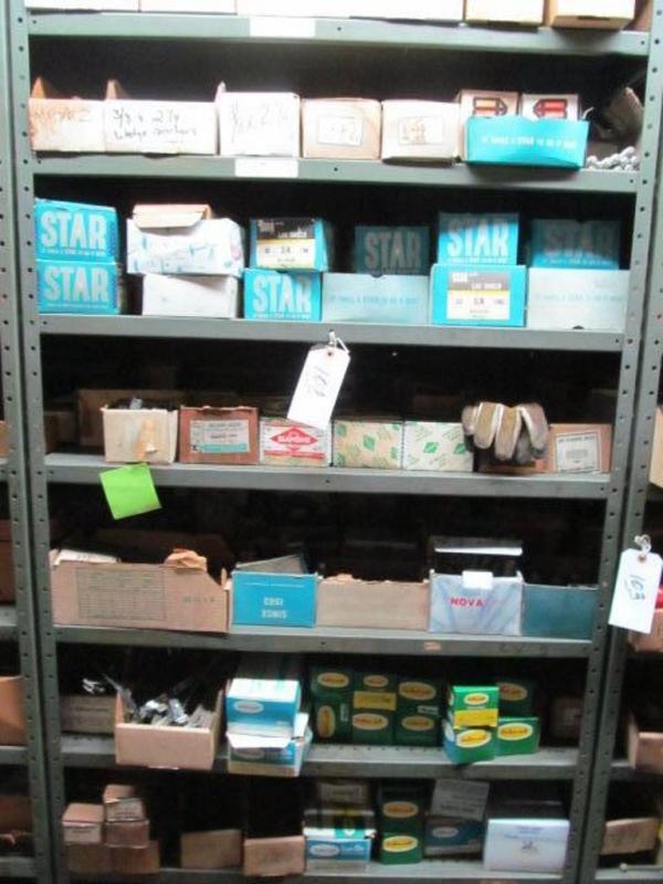 Shelf and contents consisting of miscellaneous bushings, couplings, clamps, shields