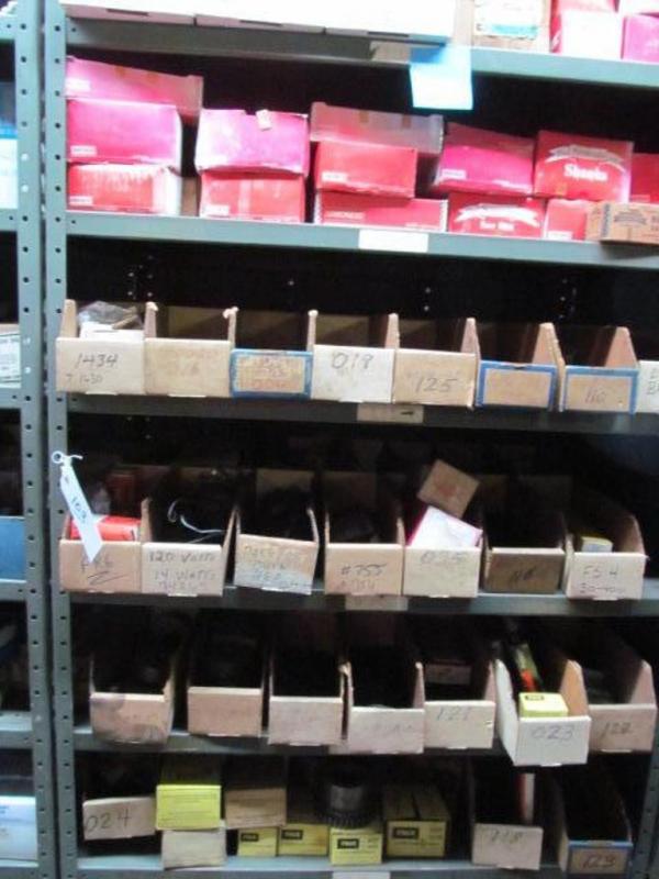 Shelf and contents; couplings, hardware, saw bits, etc.