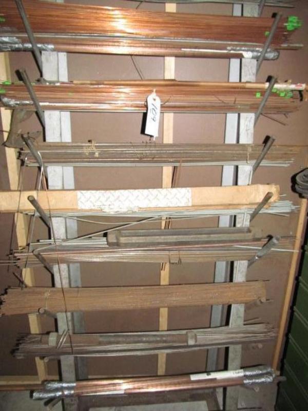 Storage rack and contents; welding rods, threaded rod,etc.