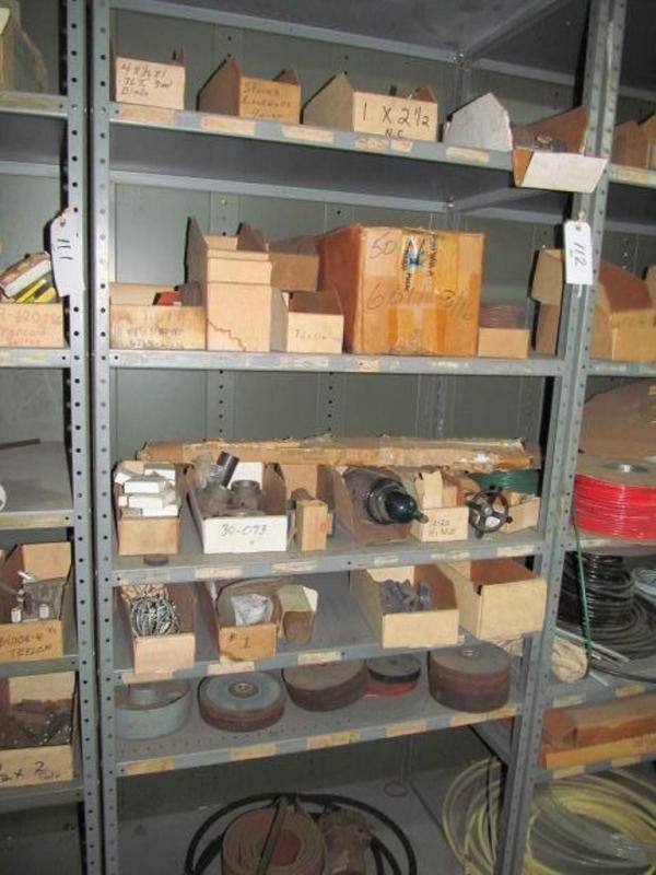 Shelf and contents: grinding wheels, hardware, etc.