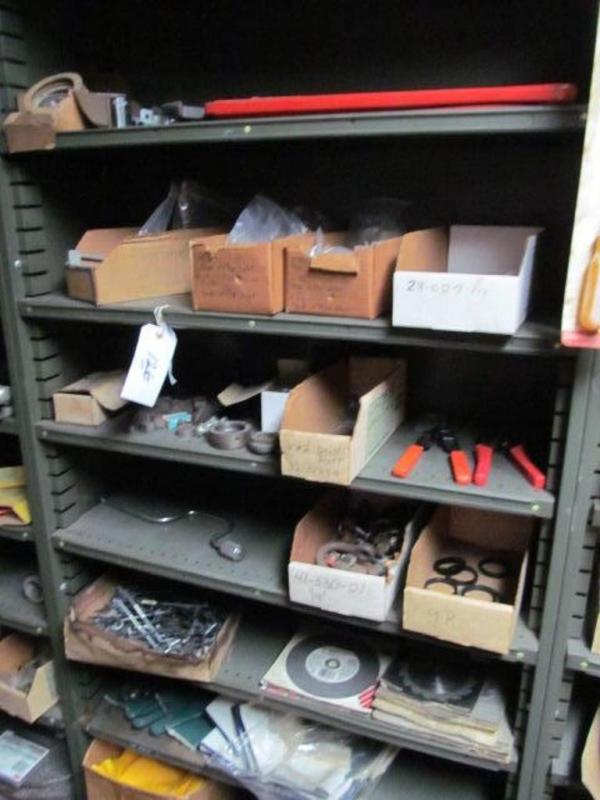 Shelf and contents miscellaneous hardware,pipe wrenches,clamps etc.