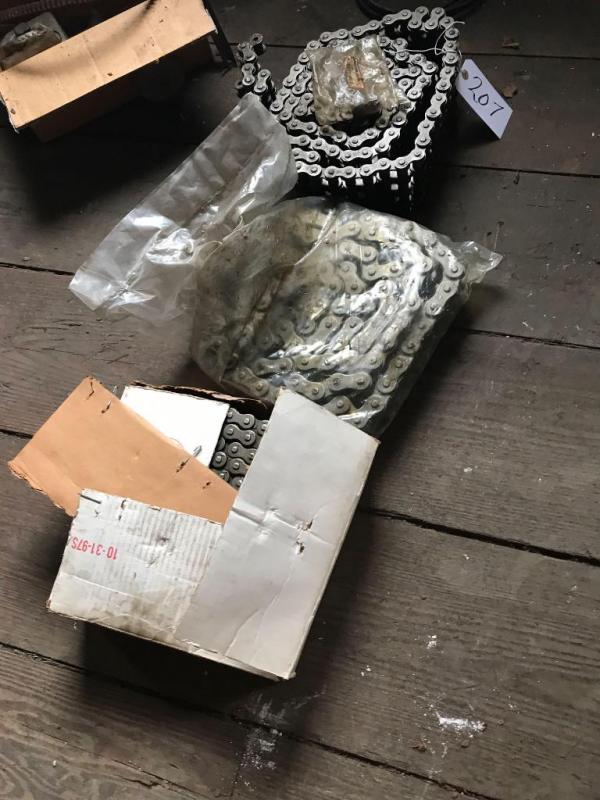 Three pieces of large roller chain