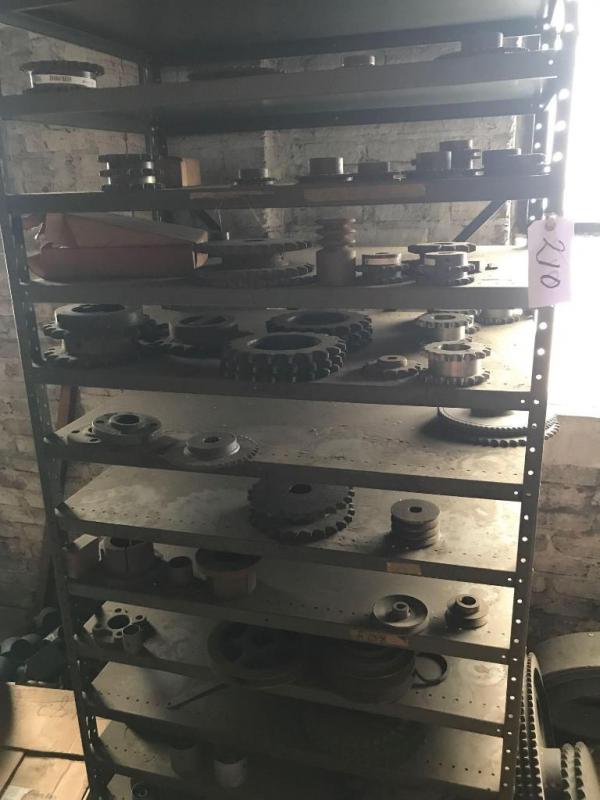Shelf and contents; large and small sprockets, etc