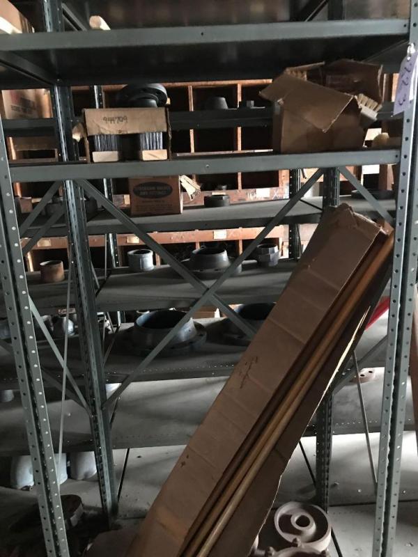 Shelf and contents; brushes and broom handles