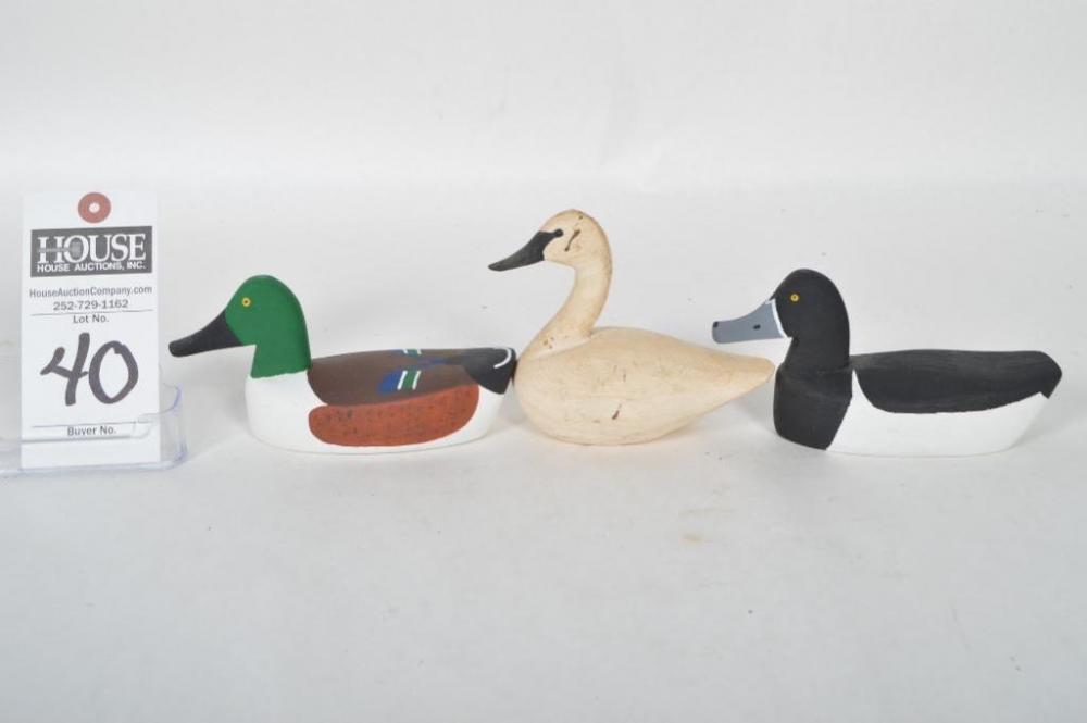 Two Roy H. Willis miniatures; Ring Neck Drake and Shoveler Drake; both are signed. Plus miniature Swan branded "RLW"; Ronnie L. Waterfield from Knotts