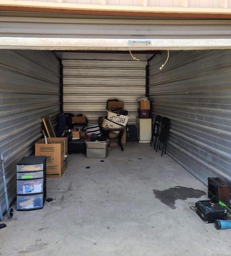 Contents of Unit - storage cabinet - folding chairs - chest - walker - pictures - fans - stool -small table -  etc.