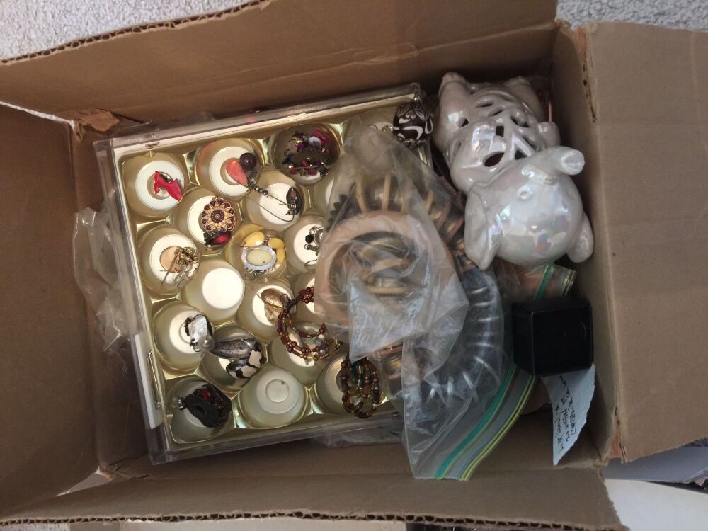 2 Boxes of Costume Jewelry. Possibly some real pieces included.