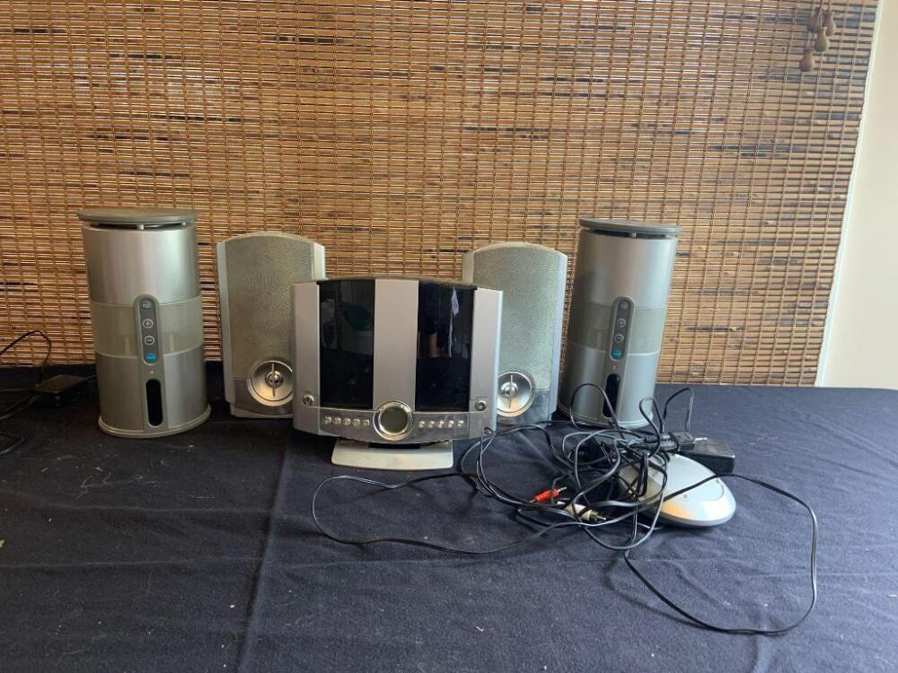 Durabrand CD player with multiple wireless speakers and one wired