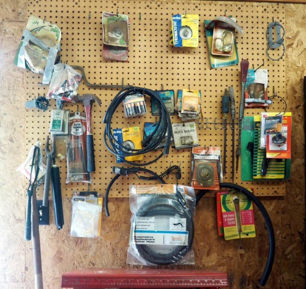 Torque Screwdriver, Automobile Thermostats, Lightbulbs, Clutch Aligning Set, Billy Club, And More; Contents Of Pegboard