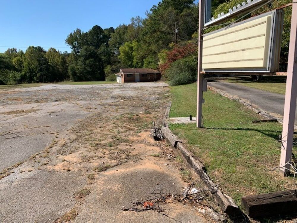 COMMERCIAL LOT & BUILDING IN LACEY'S SPRING, AL