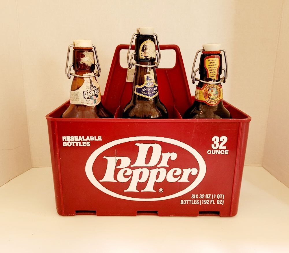 DR. PEPPER PLASTIC CARRIER FOR 32 OZ BOTTLES WITH 3 DARK BROWN BEER BOTTLES