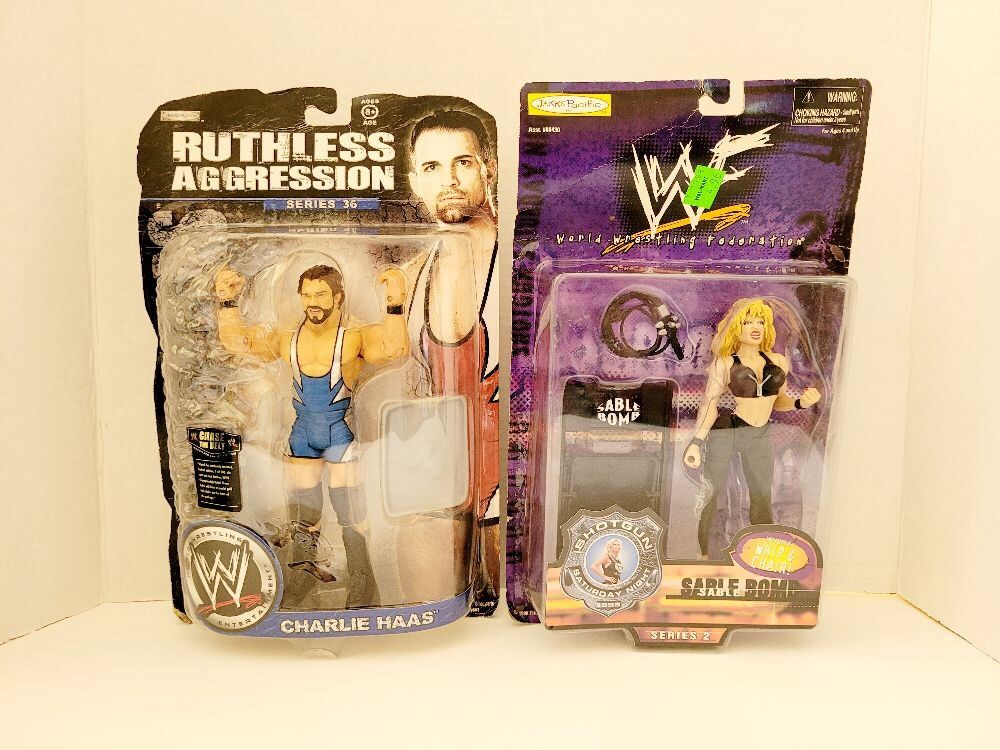 WRESTLING TOYS NEW IN PACKAGE, CHARLIE HAAS AND SABLE BOMB