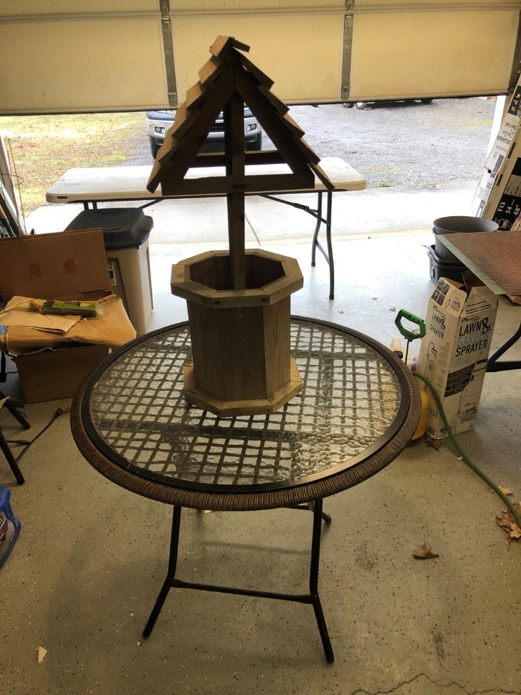 Round Outdoor Patio Table and Roofed Wooden Planter
