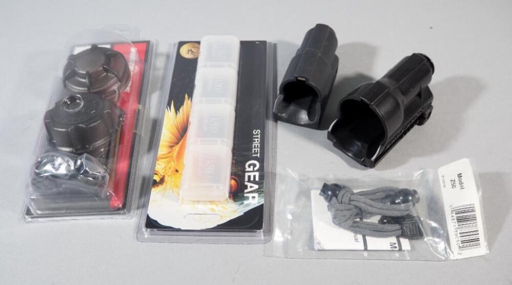 Surefire SC-1 Spares Carrier, Surefire Model Z50 Lanyard, Two Surefire Hard Plastic Flashlight Holsters, And One ASP Battery Case
