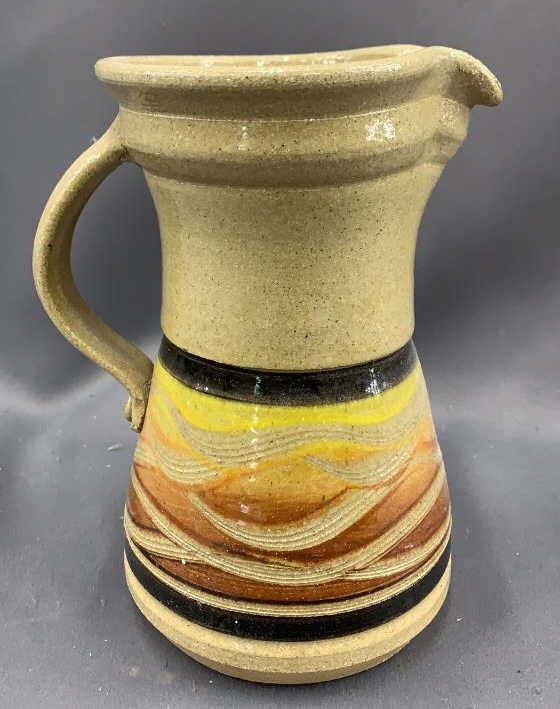 Signed Pottery Pitcher 8"