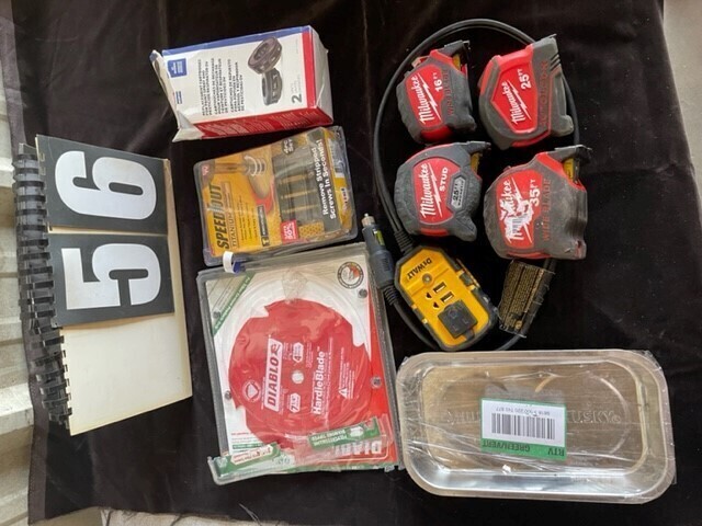 Box of Tape Measures and Other Tools image