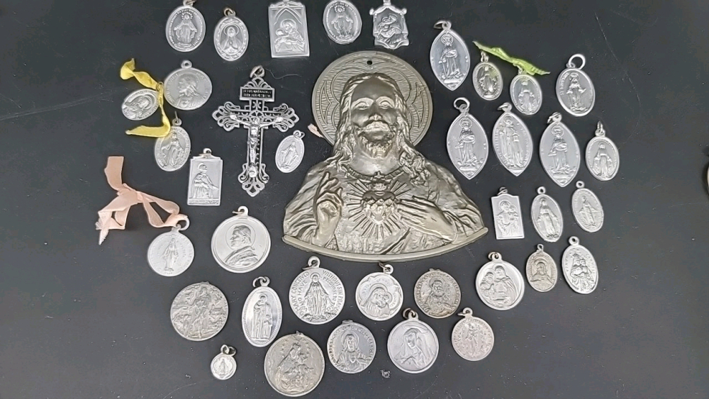 Religious medals, charms, and crosses - these are all plastic or lightweight metal