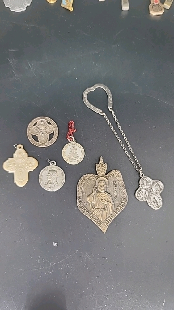 Sacred Heart religious lot: pendants, charms, and medals. These are medal