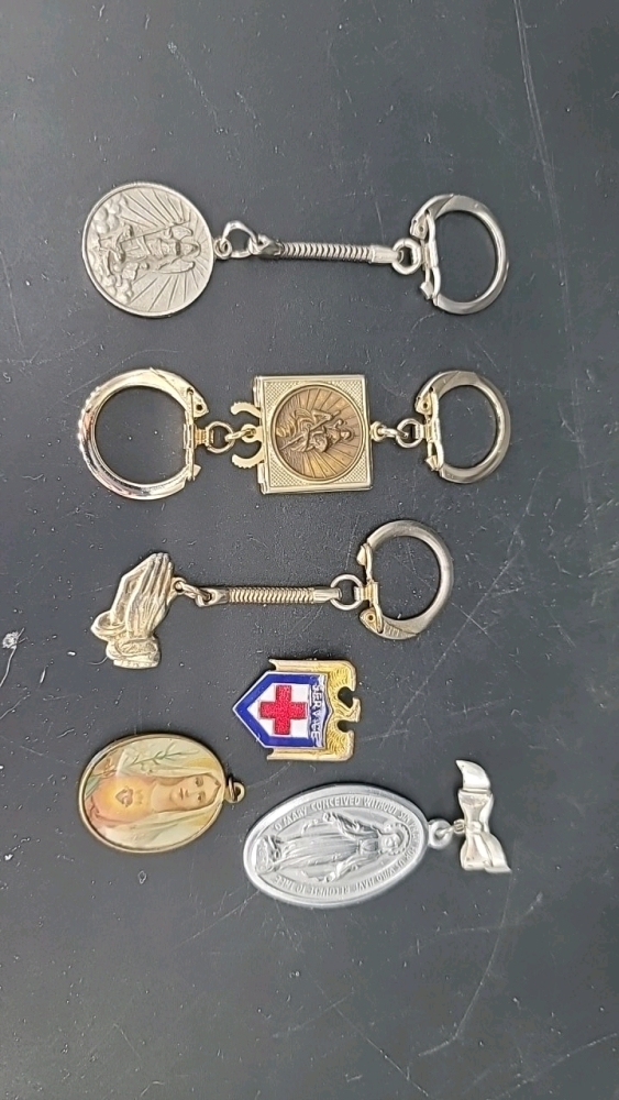 Religious key chains, service pins, pendant, and Mother Mary pin