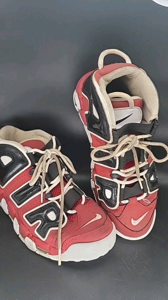 Used Air Jordans size 7.5, red, black, and white