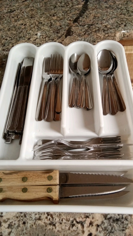 Flatware in storage container