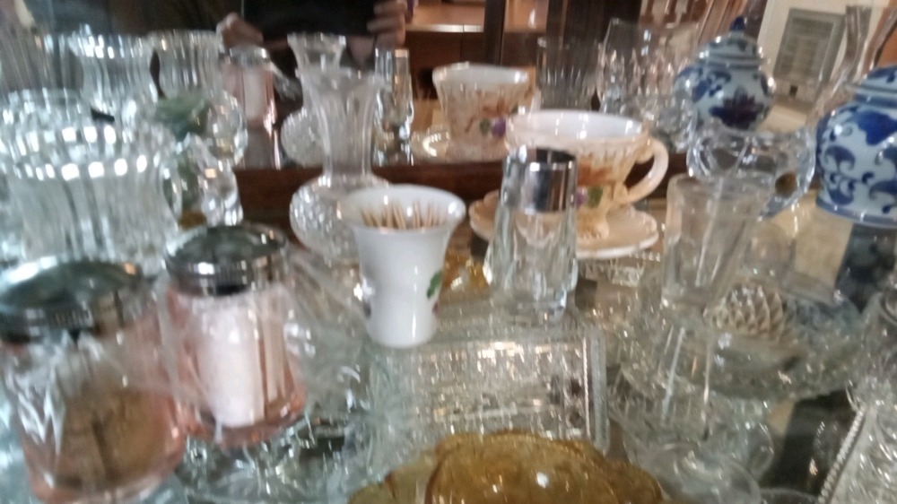 Contents of shelf in China cabinet