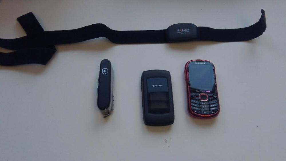 Kyocera & Samsung cell phones, Swiss army knife & Polar WearLink Coded