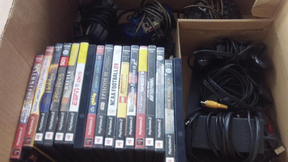 Plat Station 2 with 1 controller, 3 controllers & DVDs