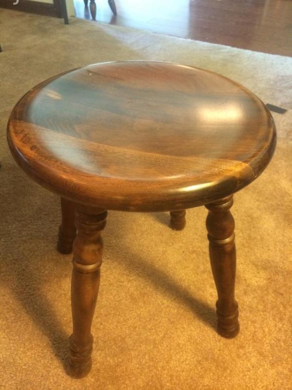 Wooden four-legged stool