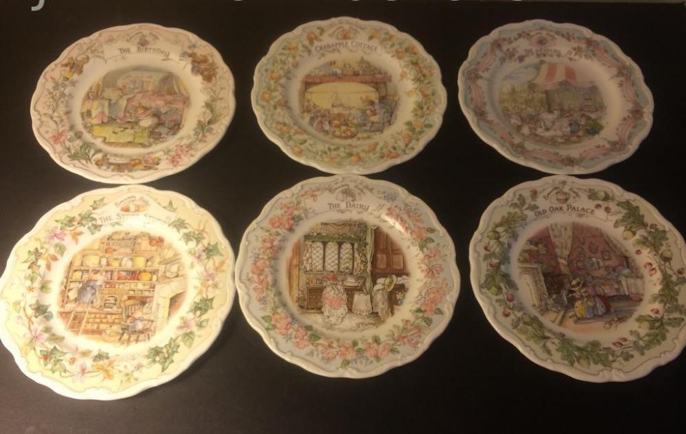 7 Royal Doulton decorative plates