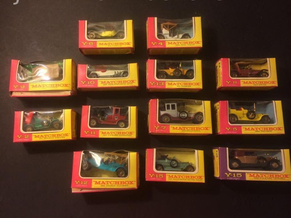 13 old Matchbox cars, original boxes