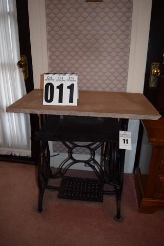 Table w/stone top and sewing machine base