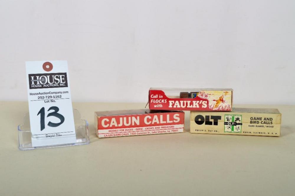 Terrific selection of (3) collectible duck calls, including a Faulk's Pintail whistle, an Lot Pintail call, and a Cajun Duck Call, with original boxes
