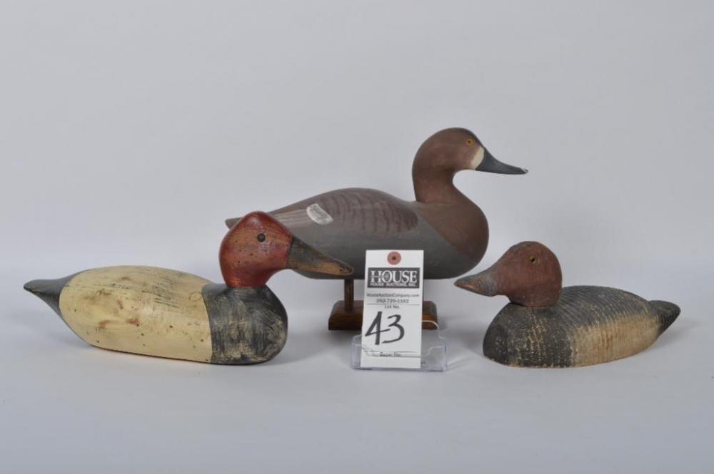 Neat trio of collectible decoys including a Blackhead Hen by J.C. Crouch, a Drake Canvasback and a Drake Redhead.