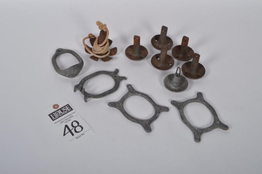 Great assortment of collectible factory made iron and lead decoy anchors, including one Herter's weight.