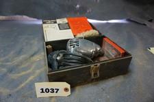 Vintage electric drill w/paper work and metal case, fury drill