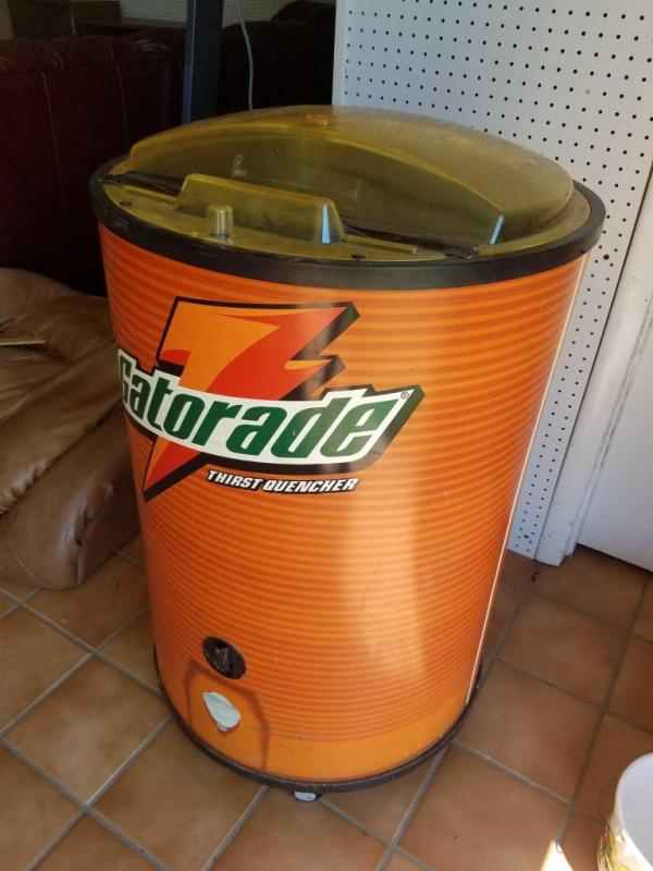 Rolling Gatorade cooler and Culligan water container