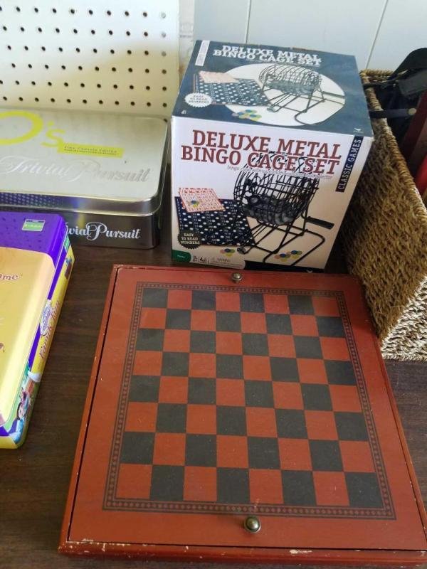 Bingo cage set, 90's trivial pursuit game, Who wants to be a Millionaire game, Cranium game