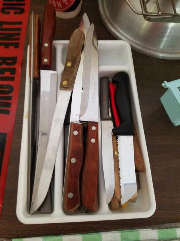Assortment of knives, kitchen utensils, misc. kitchen items, coffee mugs, can openers, thermometer
