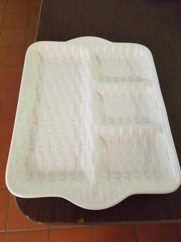 Assortment of glass platters and plastic vegetable tray