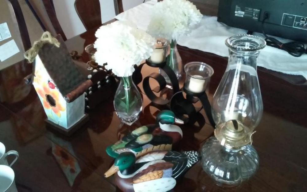 Vases, kerosene lamp, candelabra, duck figurines, bird house figurine, champaigne candle